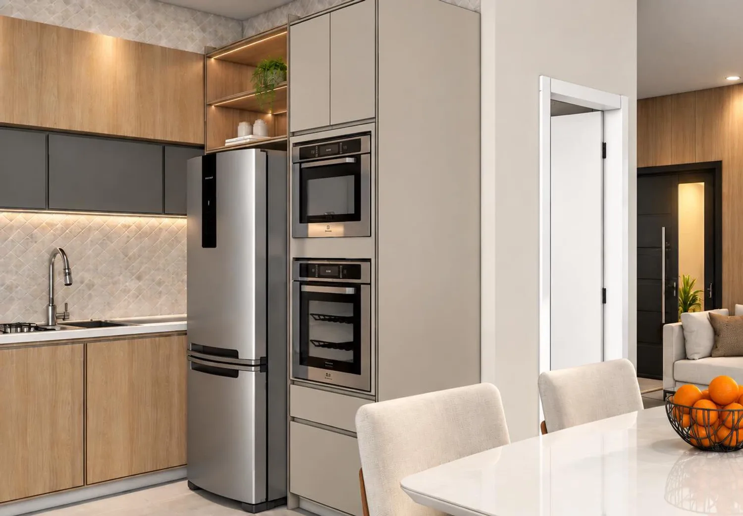 Cozinha da casa modelo com geladeira e fornos embutidos